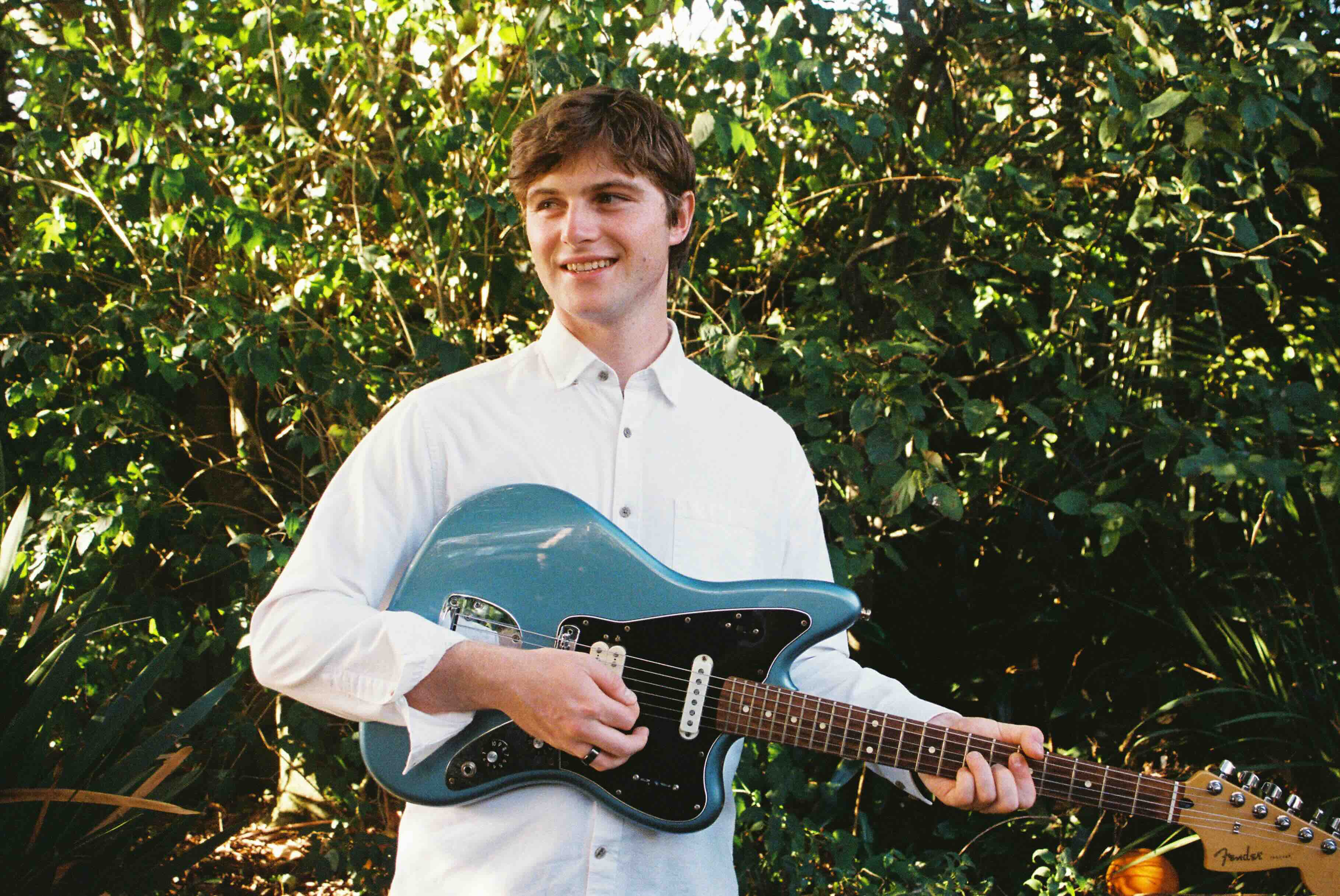 Jono playing electric guitar
